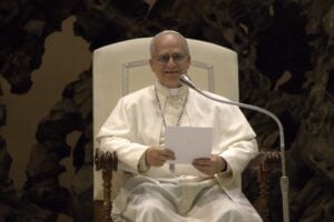 Pope Leo delivering remarks in Paul VI hall.