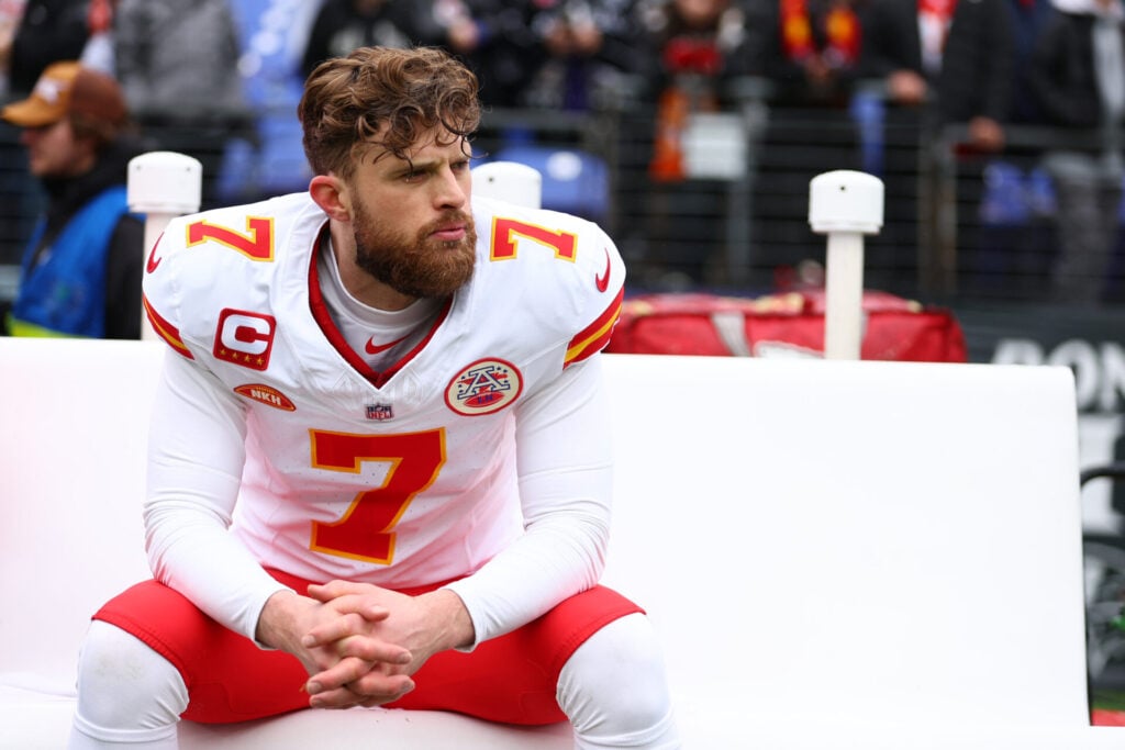 Harrison Butker on the sidelines at a Chiefs game.