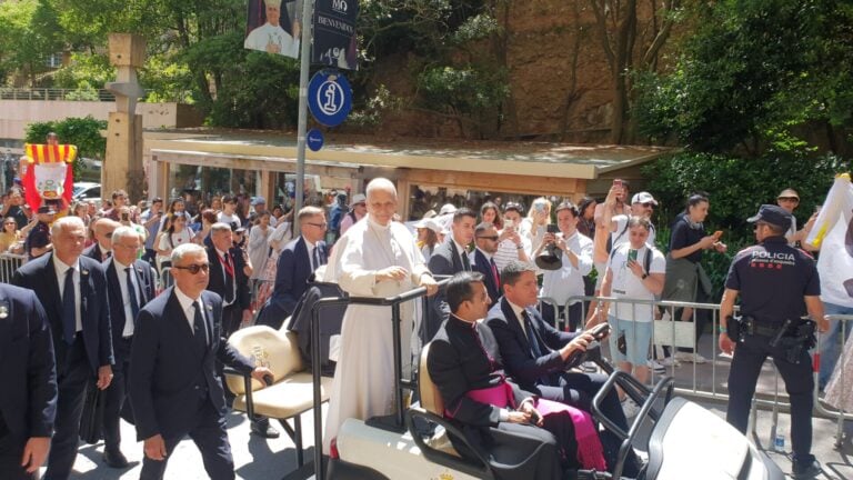 Leo XIV blessing a crowd.