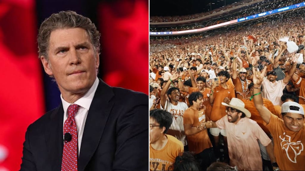 Picture of Bo French next to Indian Longhorns fans.